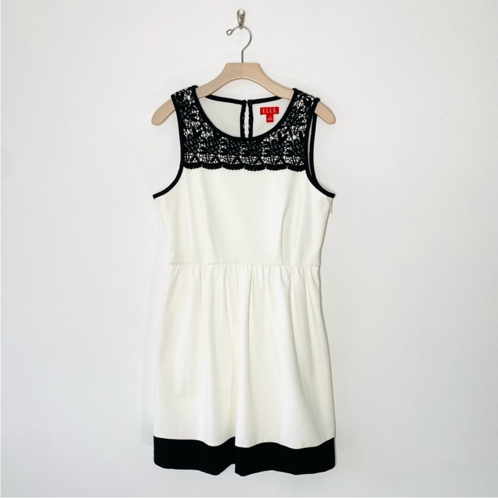 EUC L Elle white dress w/ black lace accent around the neck & black lined skirt